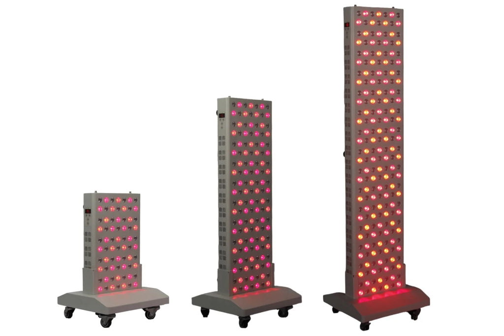 Three LED red light therapy panels of different heights on rolling stands for anti-aging and pain relief.