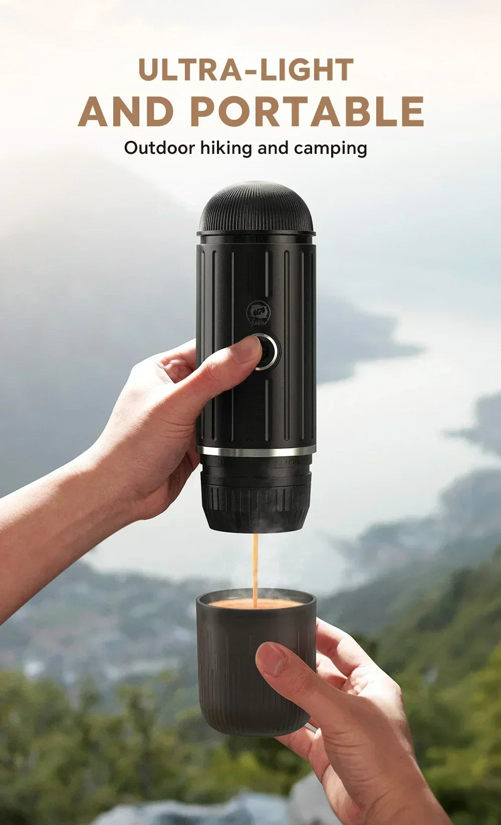 Portable black handheld espresso maker pouring coffee into a cup for hiking and camping trips.