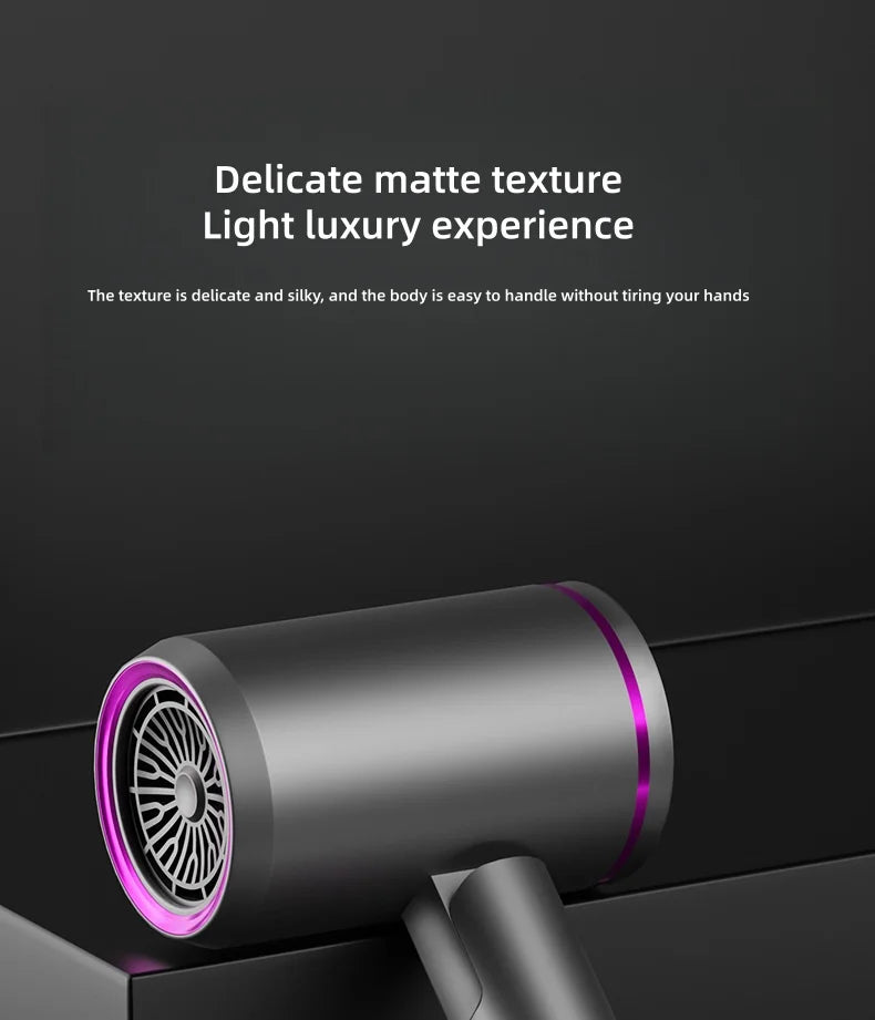 Matte grey 2400W foldable hair dryer with purple accents, silent high-power motor, and salon-grade design.