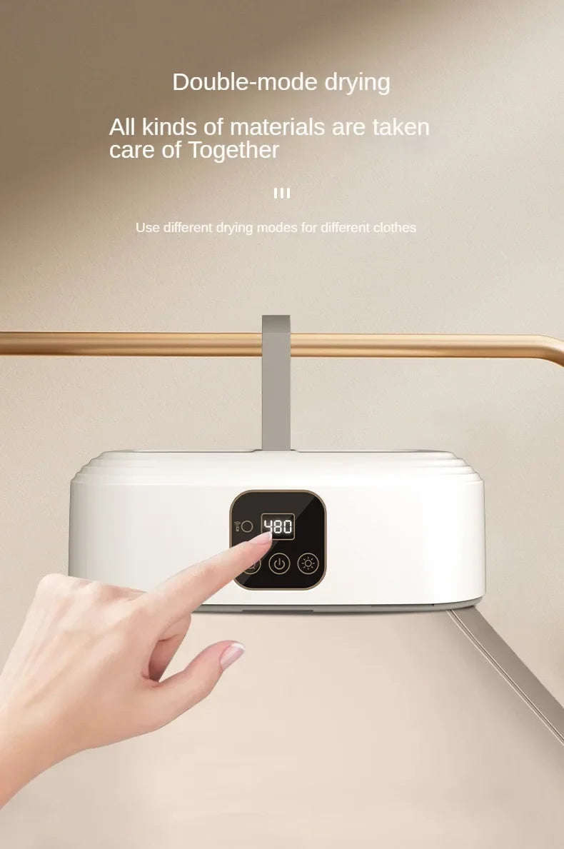 Tidesmit portable electric clothing dryer featuring UV sterilization and foldable design for easy laundry storage