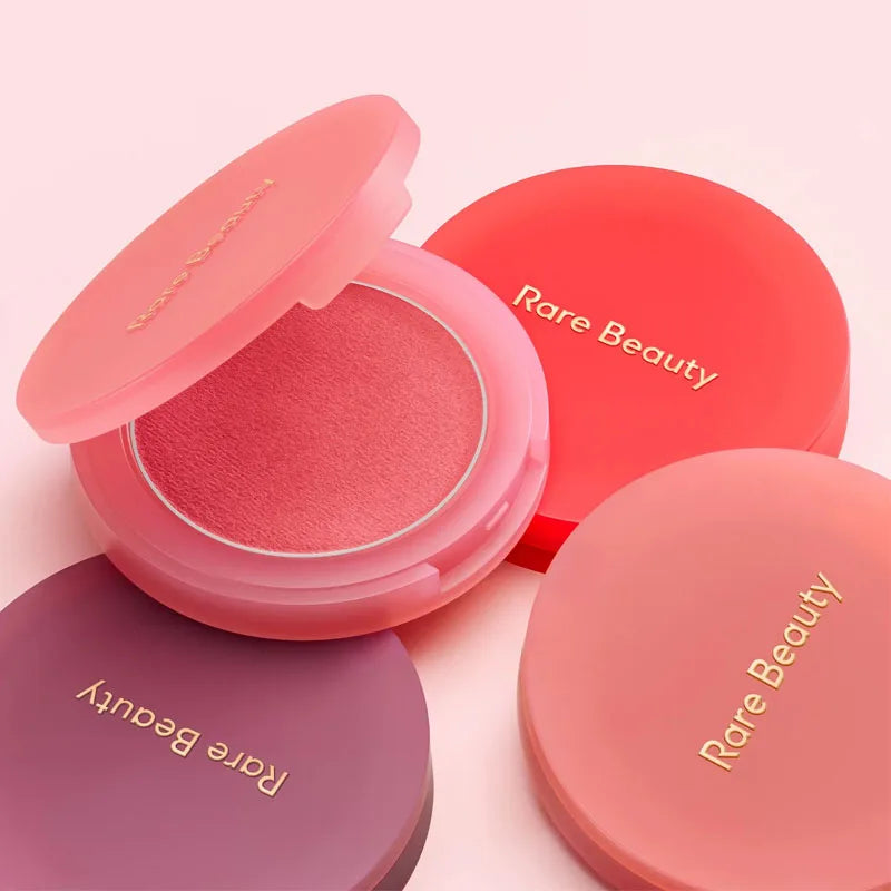 Rare Beauty Soft Pinch Luminous Powder Blush compacts in pink, coral, and berry shades with a smooth matte finish.
