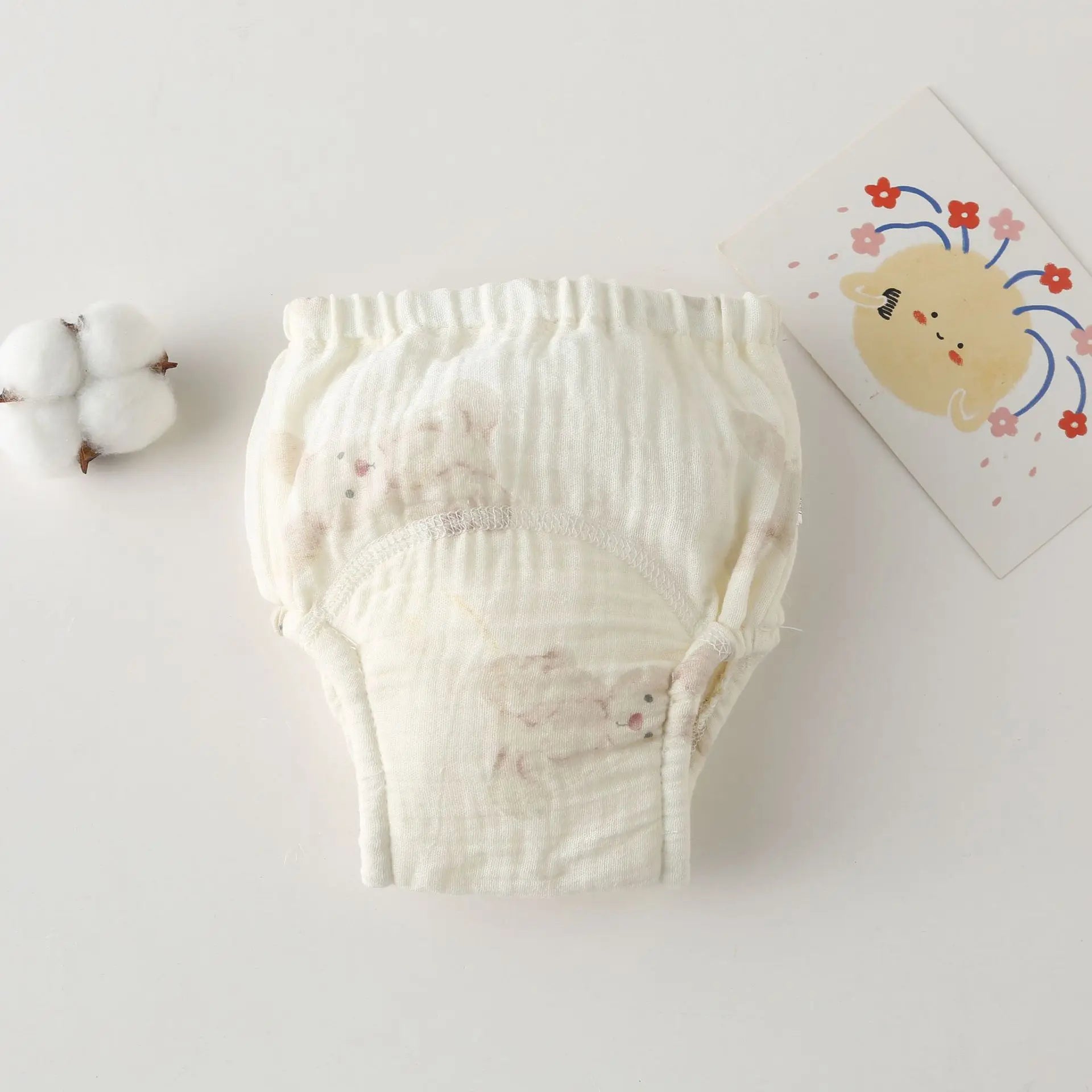 Soft muslin baby training diaper with cute bear pattern, breathable cotton baby care underwear.