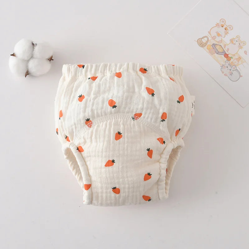 Organic cotton baby training diaper with orange carrot pattern, comfortable muslin baby care underwear.