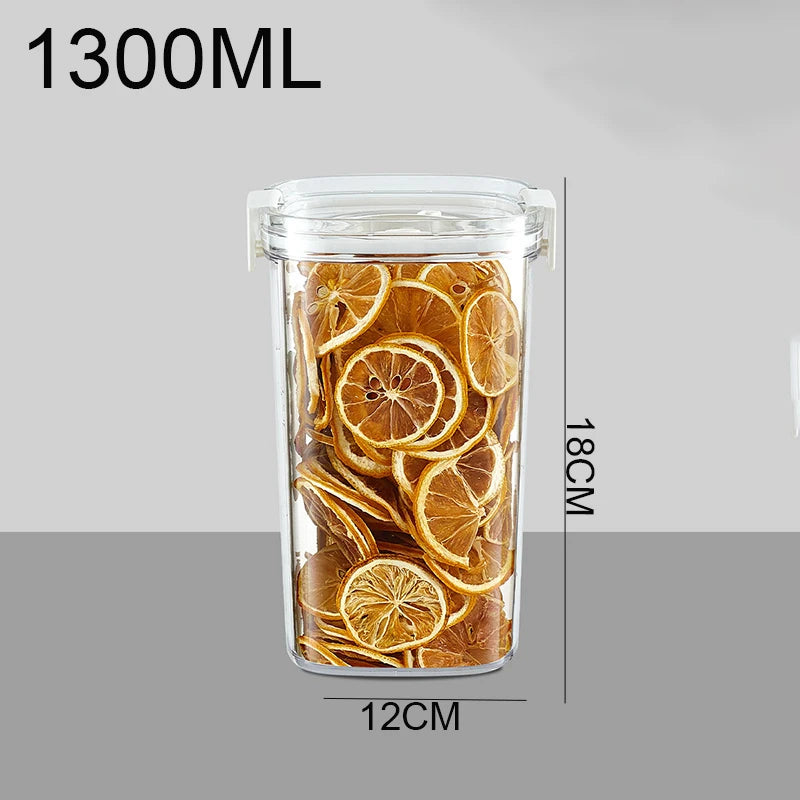 Clear vacuum jar with airtight lid filled with dried orange slices