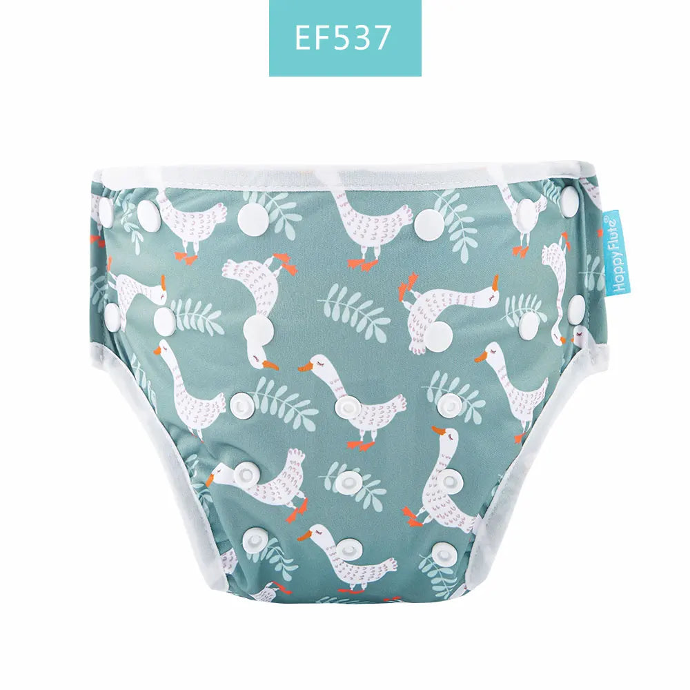 Happy Flute reusable cloth diaper with white goose pattern on green background, adjustable snap closure.