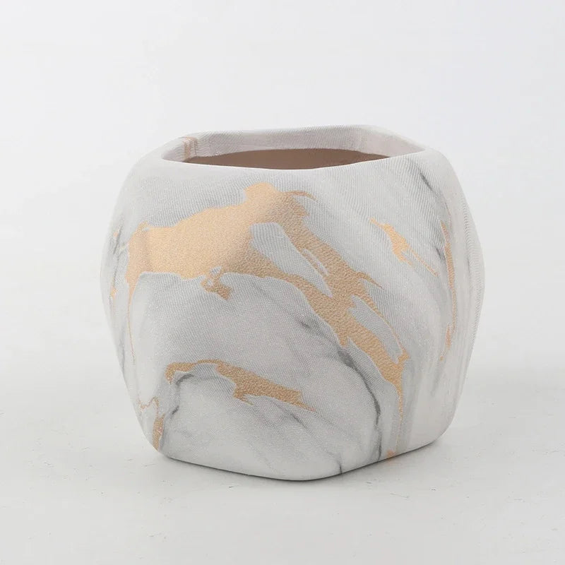 Ceramic succulent pot with marble-look finish in light gray and gold-tan accents