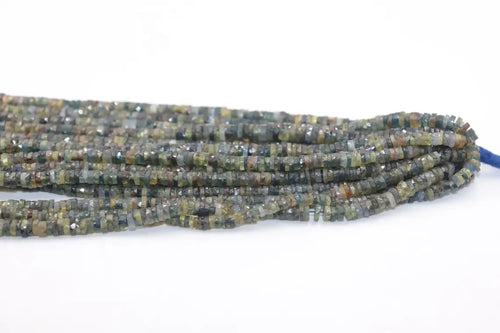 Coiled strand of small faceted tyre beads in gray-green with subtle gold highlights