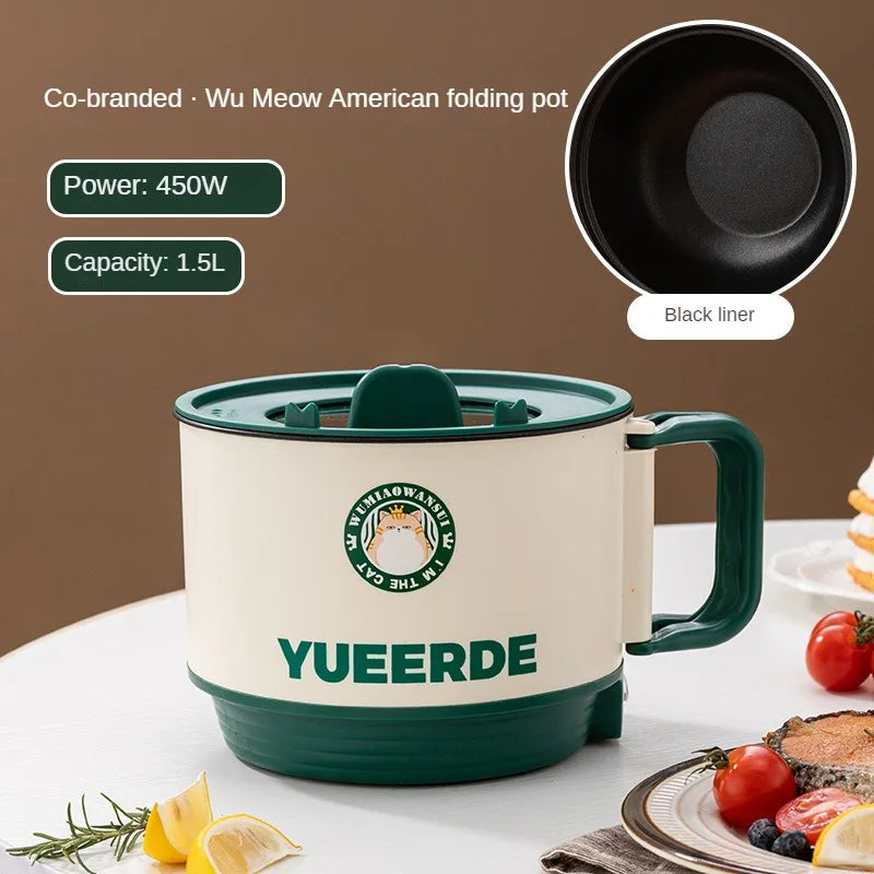 Portable electric hot pot with green outer body, side handle, and black non-stick liner
