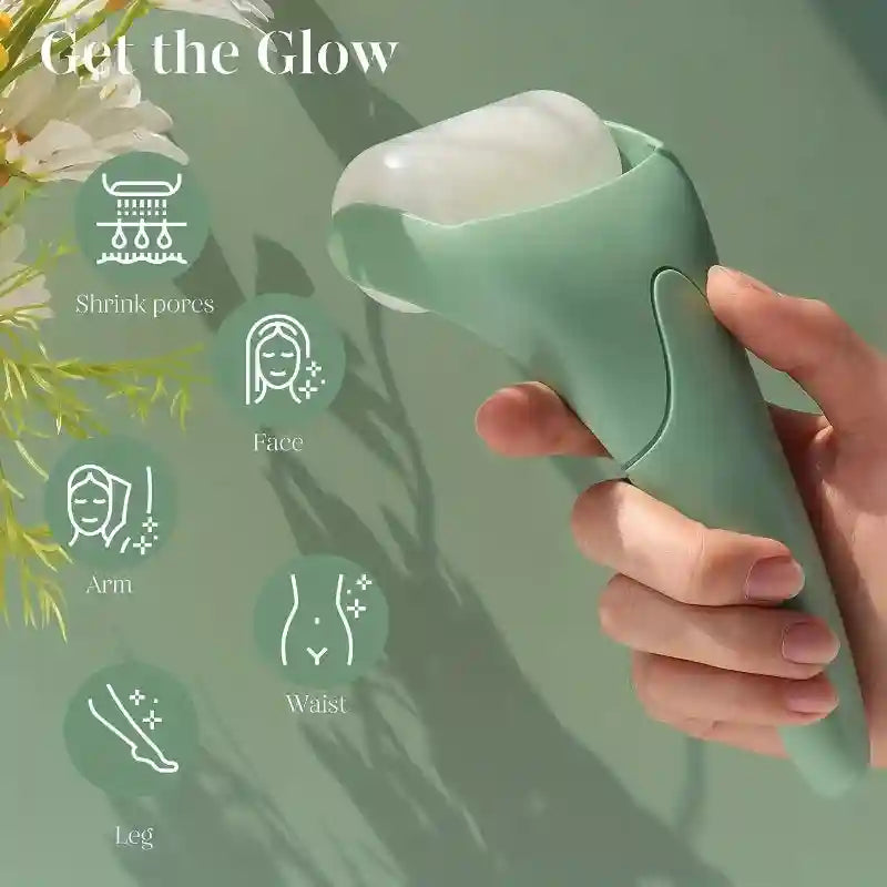 A hand holds a sage green handheld ice roller with a white cylindrical cooling head against a green background.