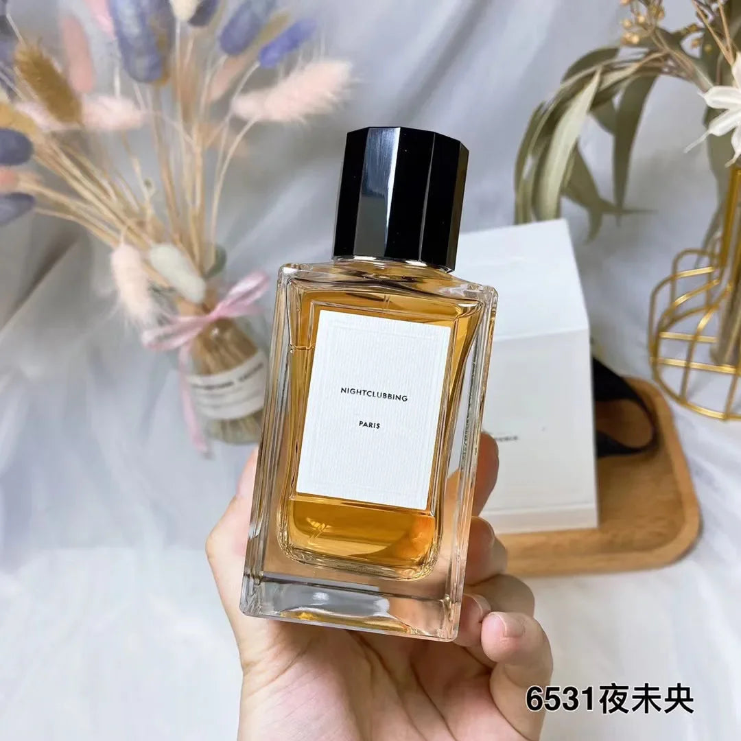 Nightclubbing Paris unisex EDP perfume in a square glass bottle with black cap. Luxury long-lasting fragrance for all.