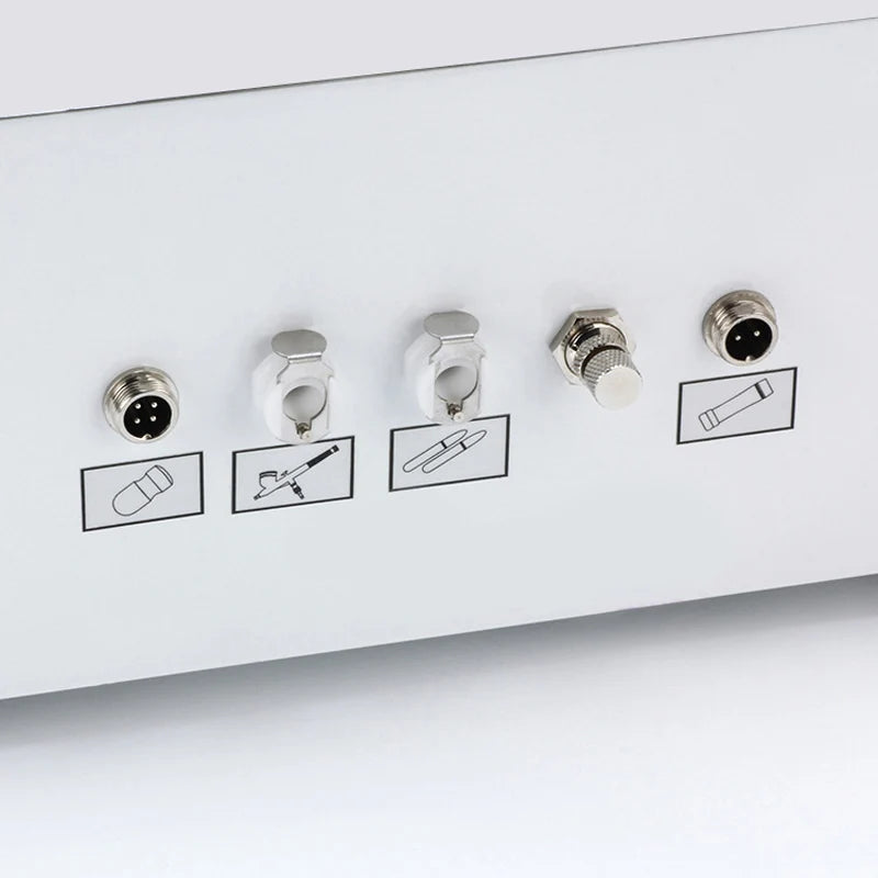 White 7-in-1 facial machine ports for hydro ultrasonic, microcurrent, and microdermabrasion skin care tools.