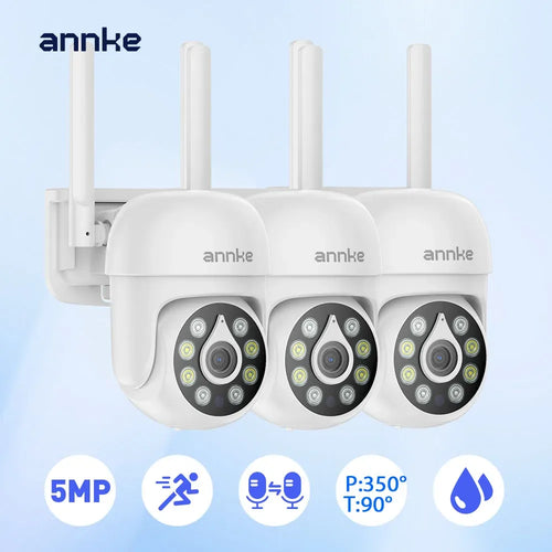 White outdoor PT security camera set with three surveillance lenses on a wall mount.