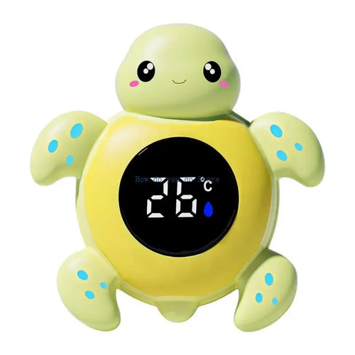 Green and yellow digital baby bath thermometer, turtle-shaped, for accurate baby health water temperature monitoring.