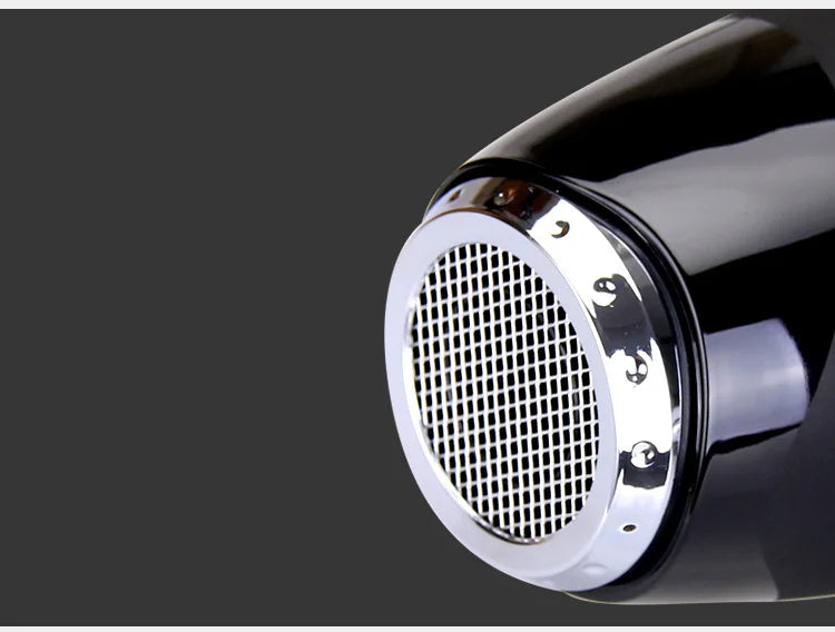 Black professional 2100W hair dryer with chrome air intake grille and high-power salon-grade design.