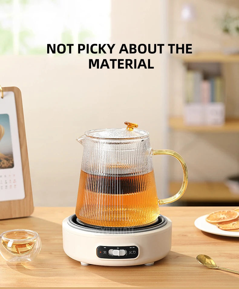 Portable split electric cooker base with clear glass kettle on top plate