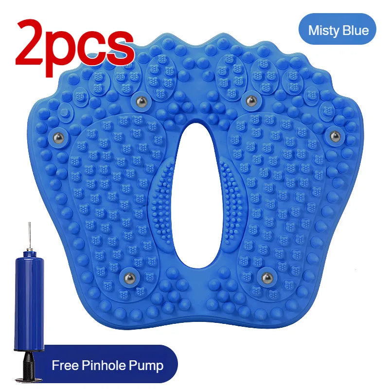 Two misty blue inflatable foot-shaped acupressure mats with texture and embedded magnetic stones, plus an air pump.