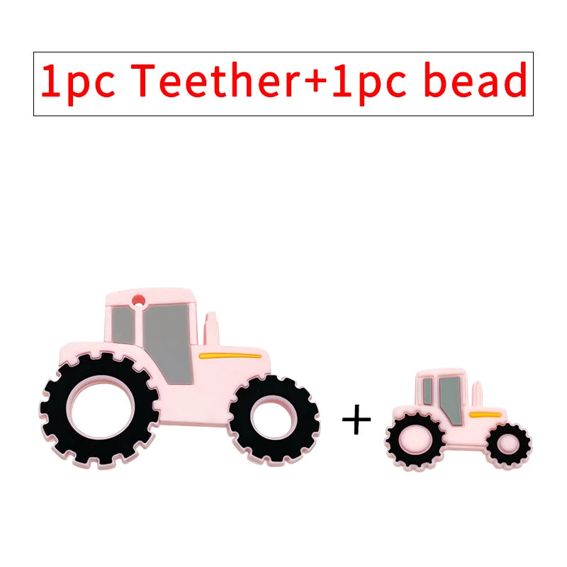 Pink tractor silicone baby teething toy and matching bead set for soothing sore gums.