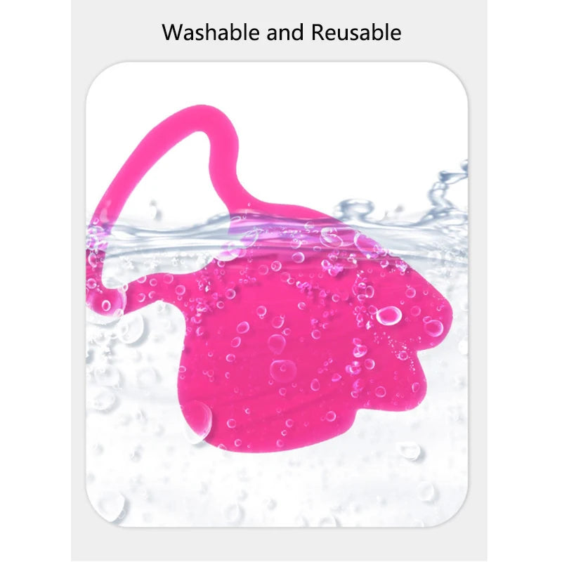 A bright pink, curved silicone facial patch submerged in water with bubbles, labeled as washable and reusable.