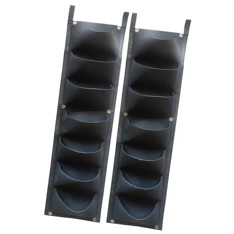 Pair of black vertical wall planter grow bags, each with seven sewn pockets