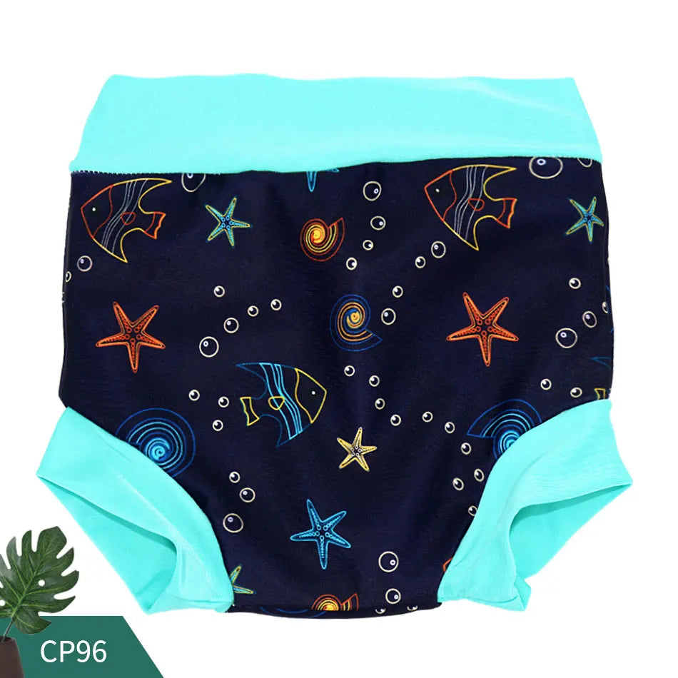 Reusable baby swim diaper featuring a dark blue ocean print with fish, starfish, and turquoise trim, model CP96.