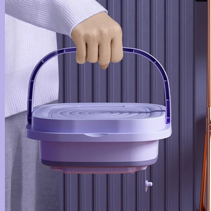 Tidesmit portable foldable washing machine featuring a built-in spin dryer for socks and delicate laundry items.