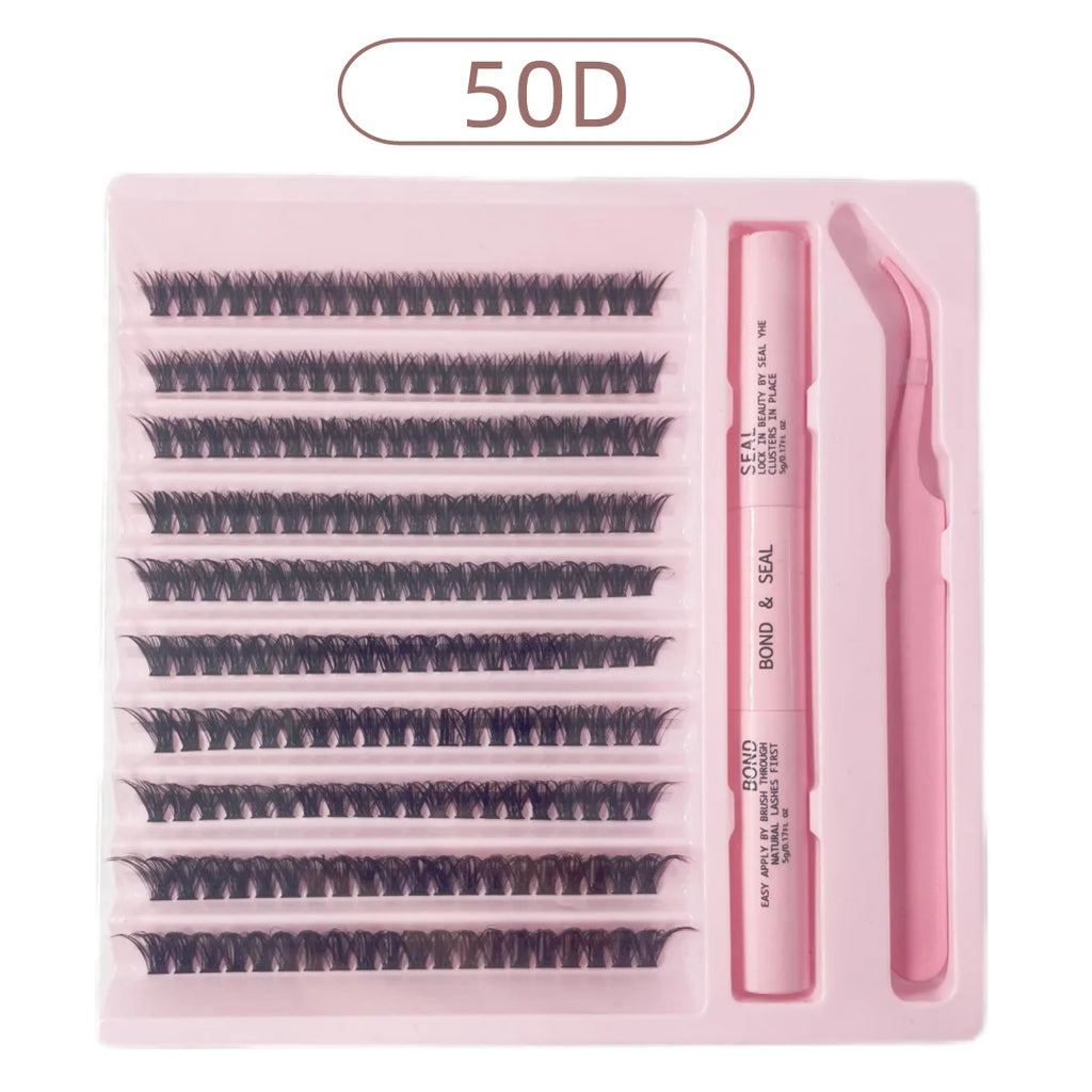 DIY eyelash cluster kit with black lash segments, bond and seal duo glue, and pink tweezers in a pink tray.