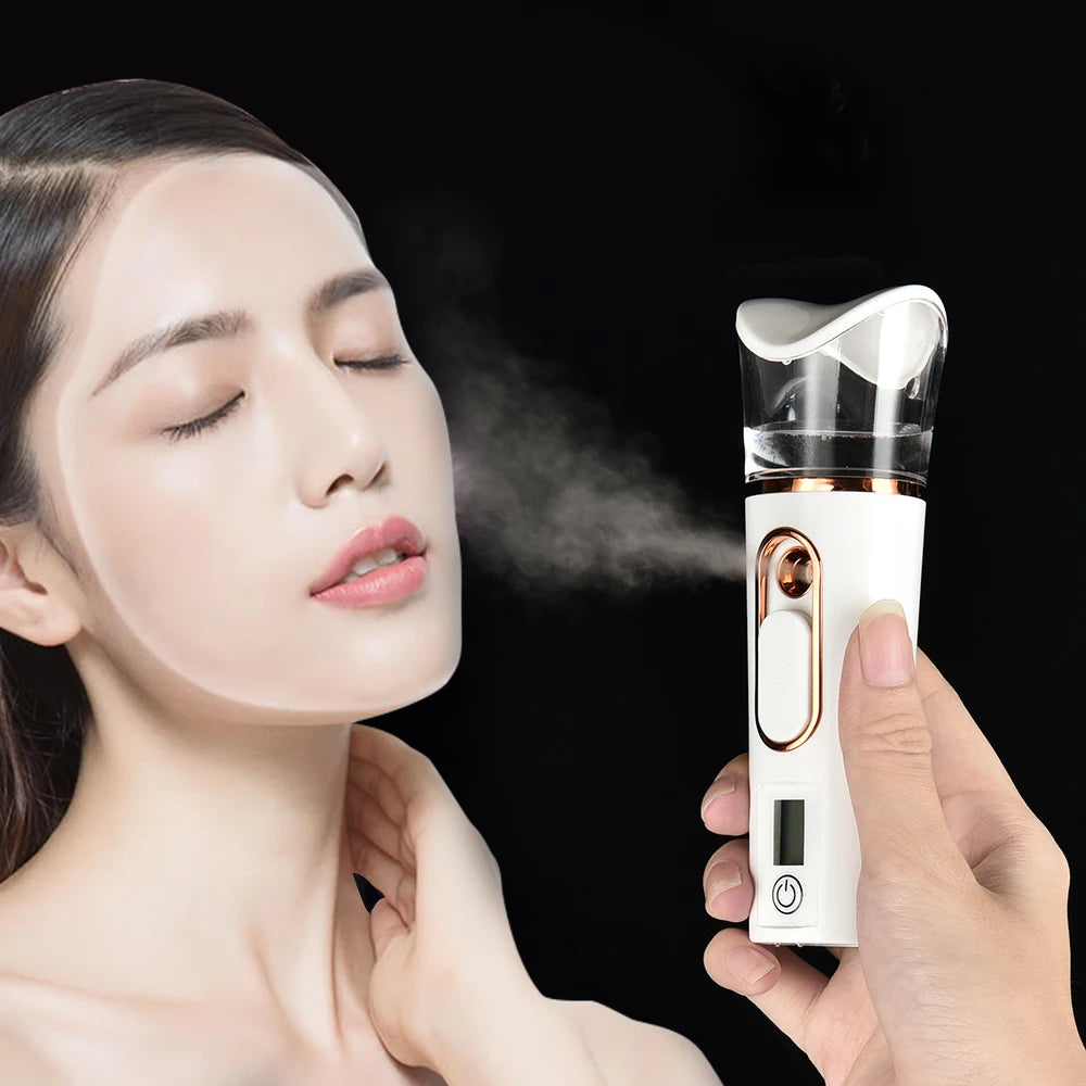 Portable white nano facial sprayer misting cool hydration on a woman's face for skin moisturizing.