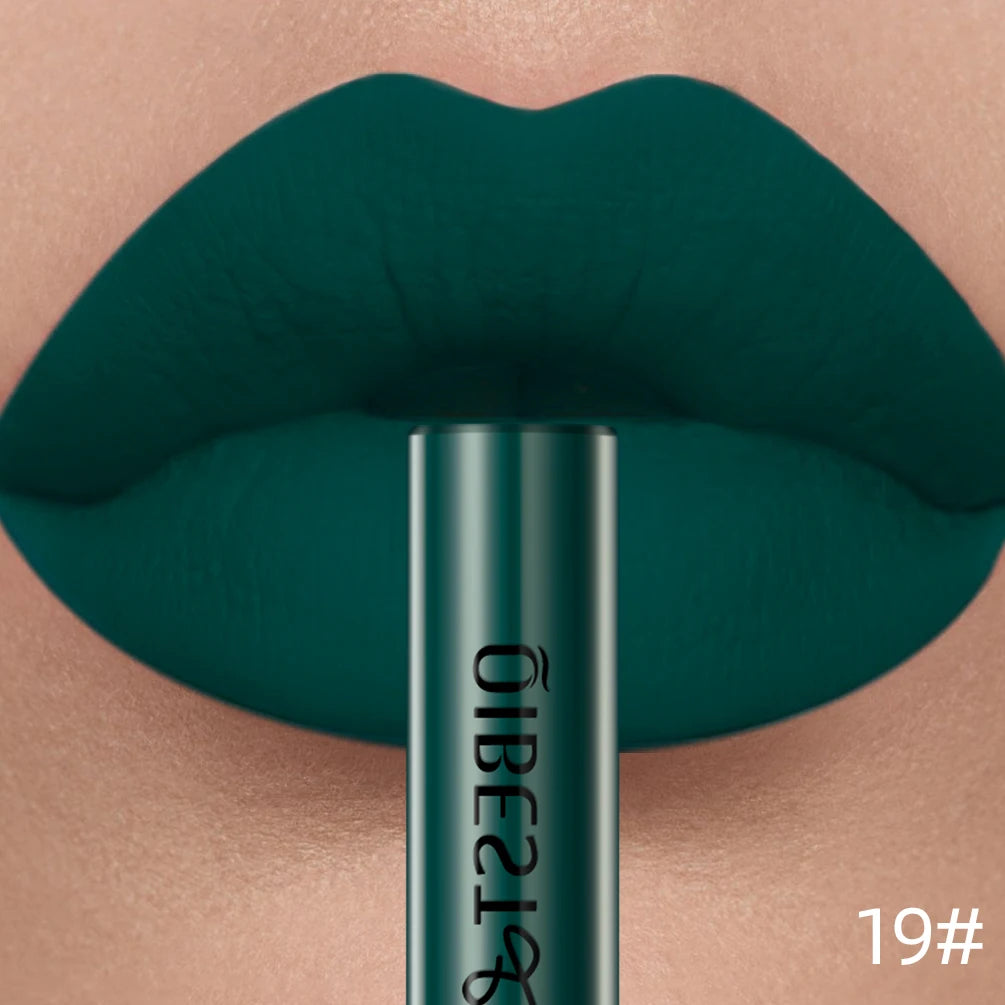 QIBEST dark green velvet liquid lipstick on lips with a nonstick, long-lasting matte finish. Makeup swatch shade 19#.