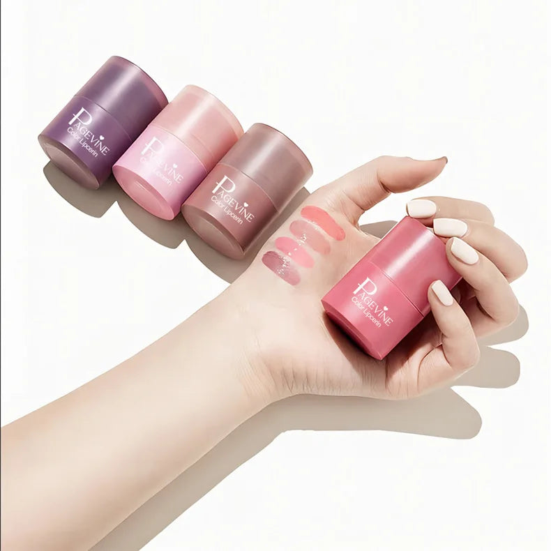 Trending twist-up tinted lip balm with hydrating, glossy texture swatched on hand in various shades.