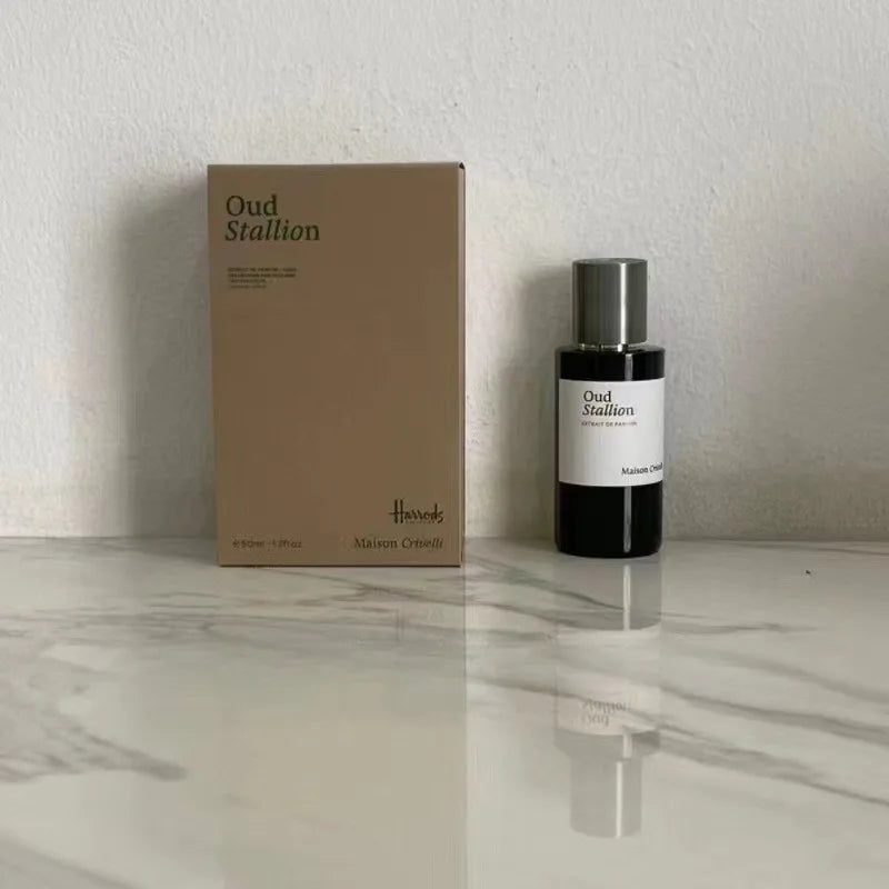 Maison Crivelli Oud Stallion unisex 50ml EDP. Luxury black cylindrical perfume bottle with box. Long-lasting oud scent.