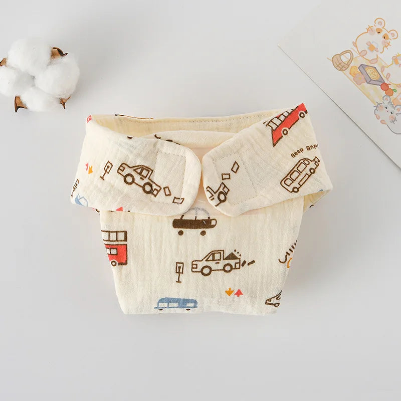 Baby care cloth training diaper in cream with cute red and blue car print, featuring adjustable hook and loop closure.