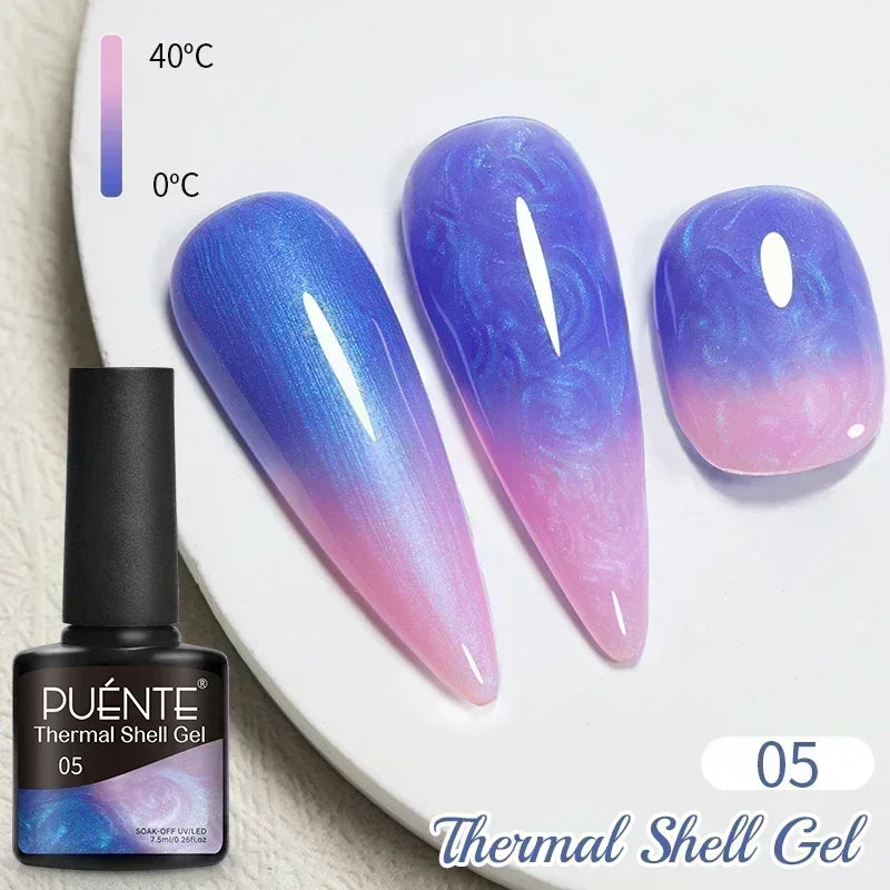 Thermal shell gel nail polish in a blue-to-pink color-changing gradient on three different shaped nail tips.