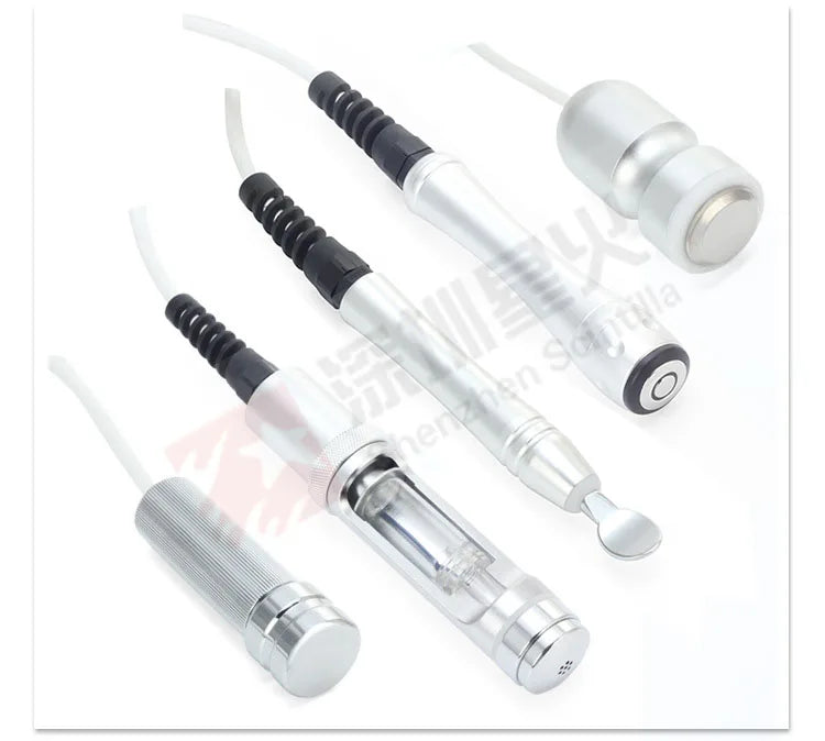 Silver 7-in-1 facial machine handpieces for ultrasonic, RF, microcurrent, and microdermabrasion skin care treatments.