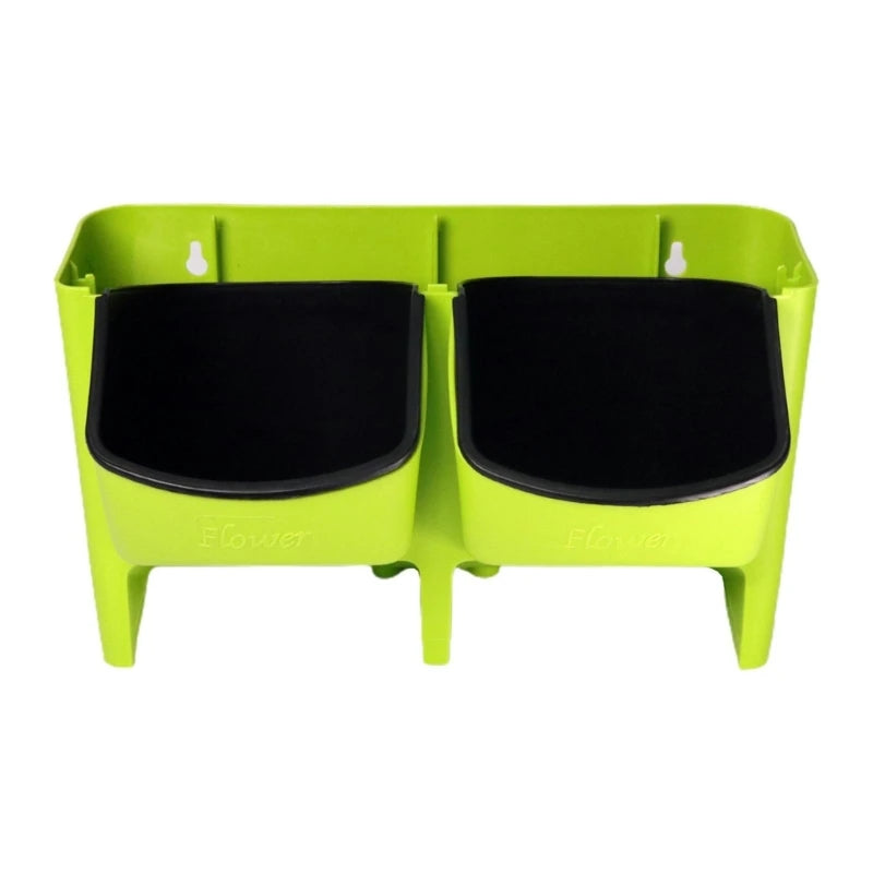 Lime green double-pocket hanging wall planter with two black cup inserts.