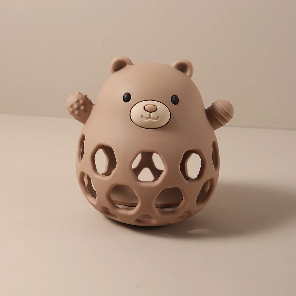Brown bear silicone teething toy for baby relief and sensory play.