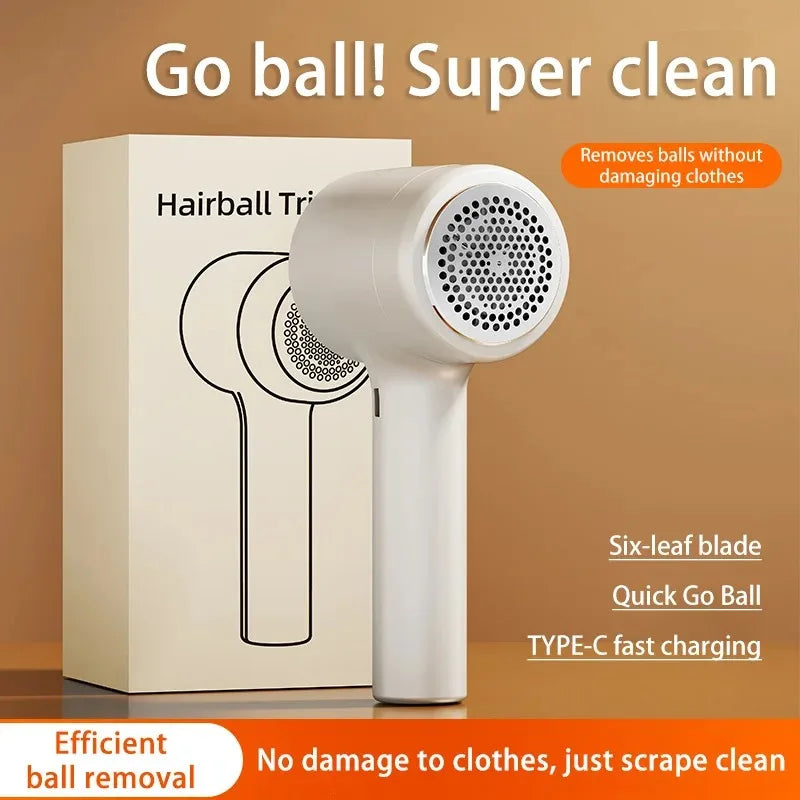 Tidesmit rechargeable fabric shaver removing lint and hair balls from clothing, detail view of the trimmer head