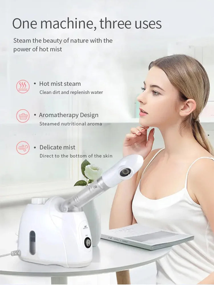 White mini facial steamer machine for home spa, aromatherapy, and deep pore cleansing with hot nano mist spray.