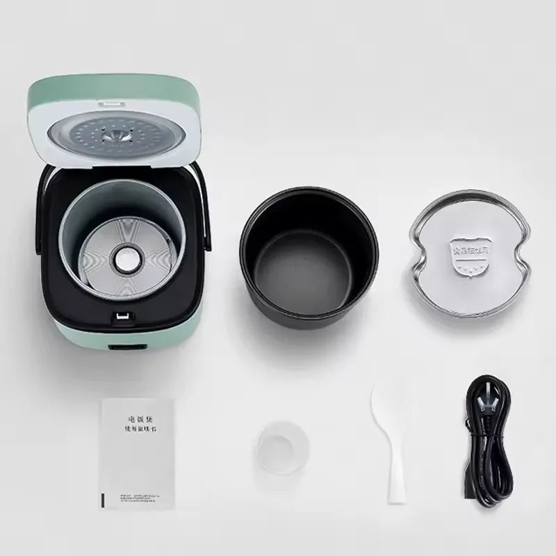 Mini electric rice cooker components, open lid, inner pot, lid top and power cable