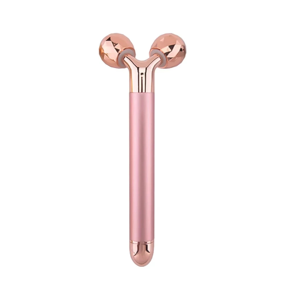 Rose gold Y-shaped facial massager with two textured, spherical rollers on a sleek, smooth handle.