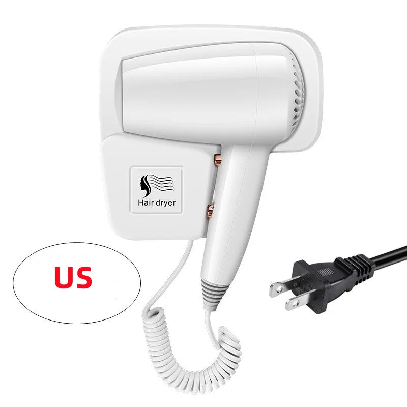 White wall-mounted hair dryer with coiled cord, US plug, and holder. Compact bathroom dryer for home or hotel use.