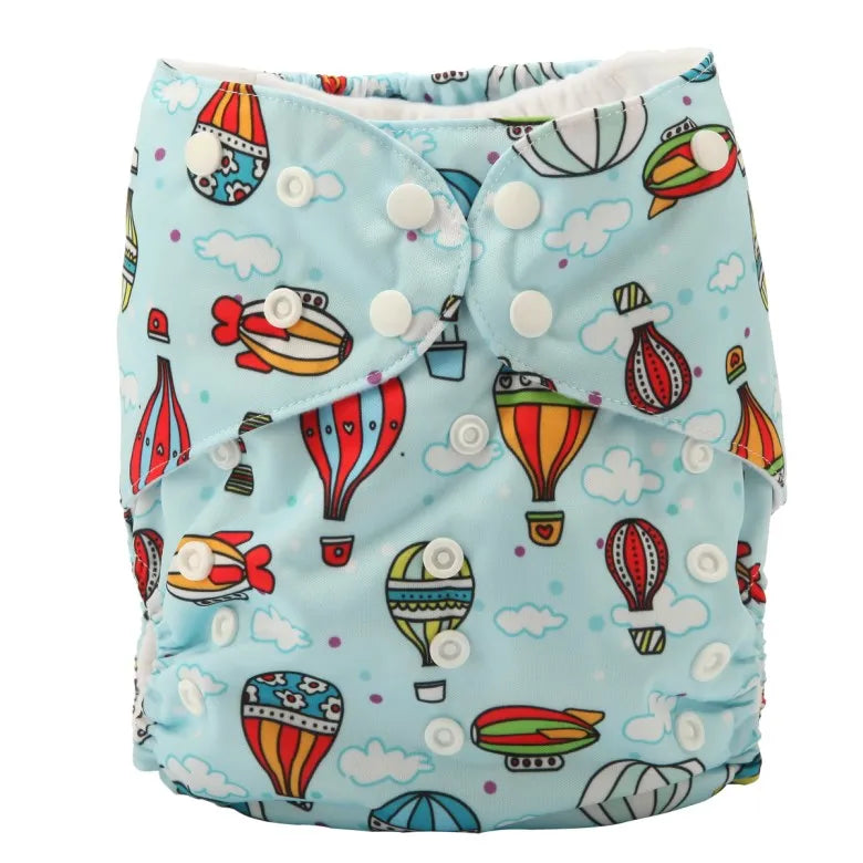 Reusable baby cloth diaper in light blue with colorful hot air balloon print and adjustable snap buttons.