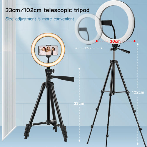 A 30cm circular LED ring light on a black telescopic tripod with a phone mount for photography and video recording.
