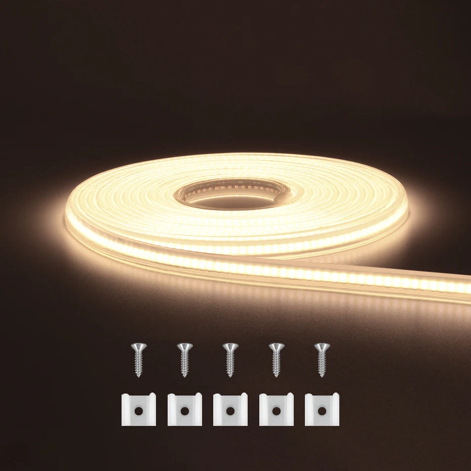 Flexible COB LED strip light roll emitting warm light with five mounting clips