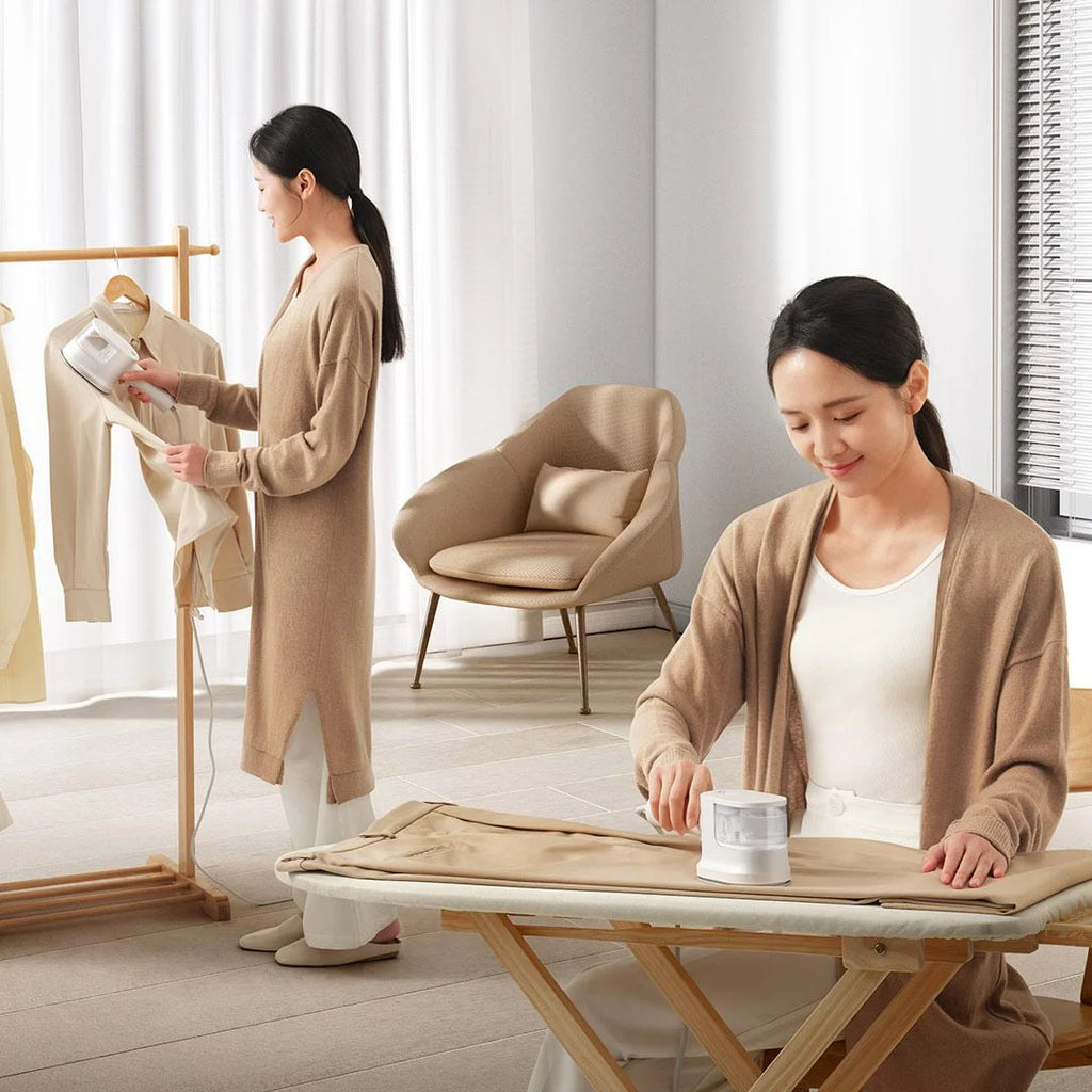 Tidesmit MIJIA portable garment steamer showing compact nozzle design for efficient vertical ironing of clothes