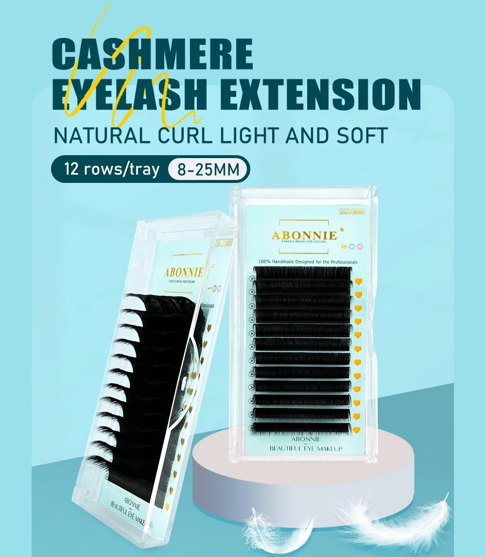 Two trays of Abonnie matte black individual cashmere eyelash extensions on a light blue background.