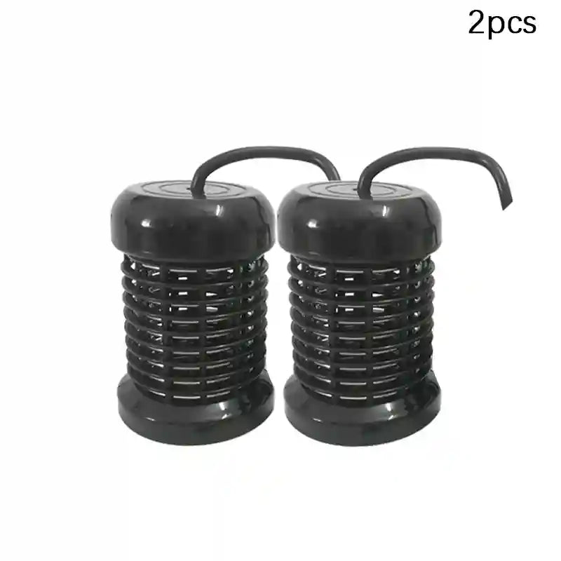 Two black round ion array heads for foot detox spa machines with ribbed cylinder design and top cord connection.