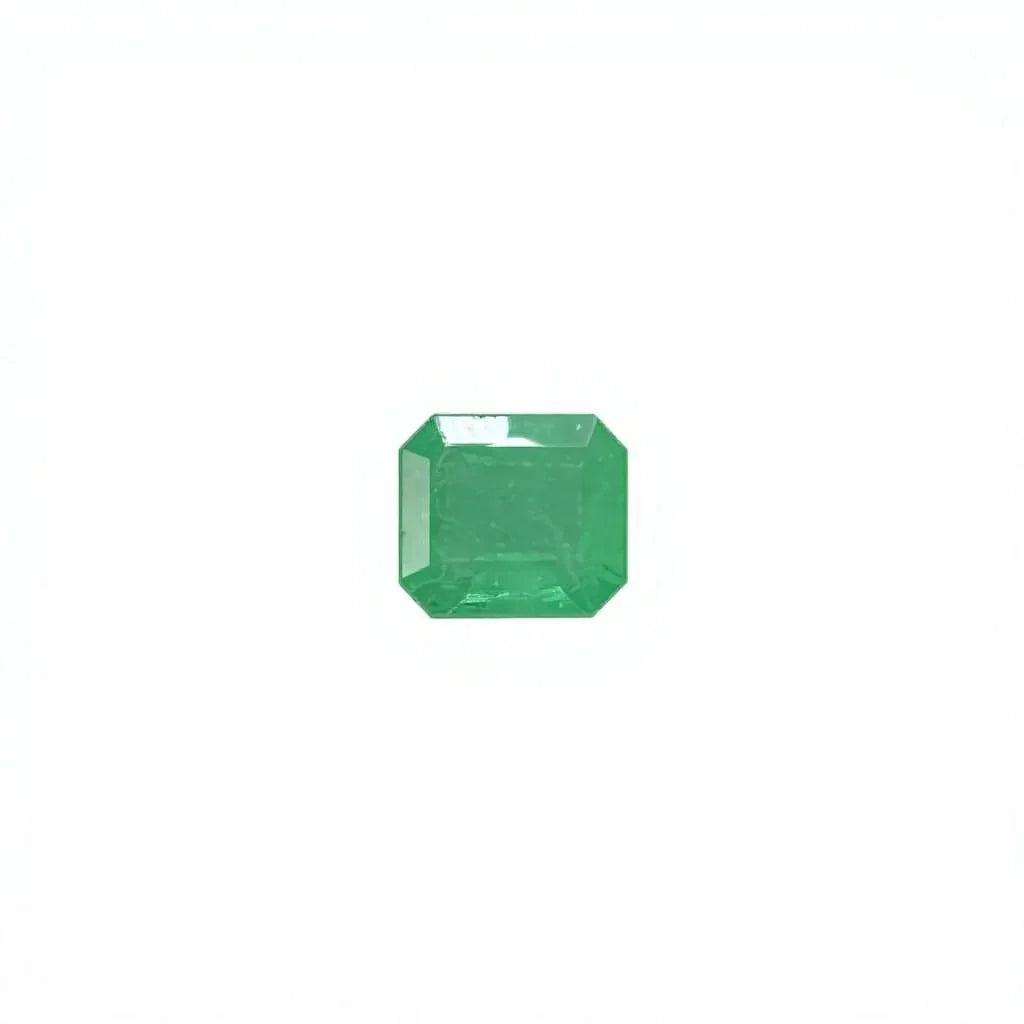 Green emerald-cut loose gemstone, octagon shape with sharp edges