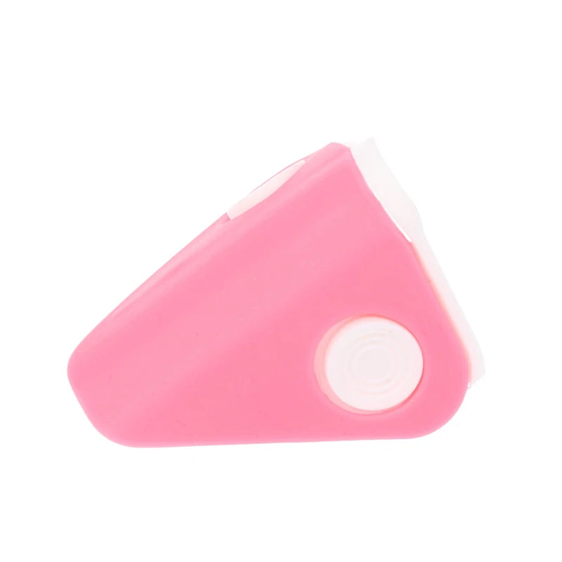 Pink silicone nose shaper clip for bridge lifting and facial correction beauty tool, isolated on white background.