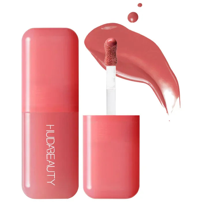 Hydrating lip and cheek tint stick in a natural pink-rose shade with a smooth, creamy swatch and applicator.
