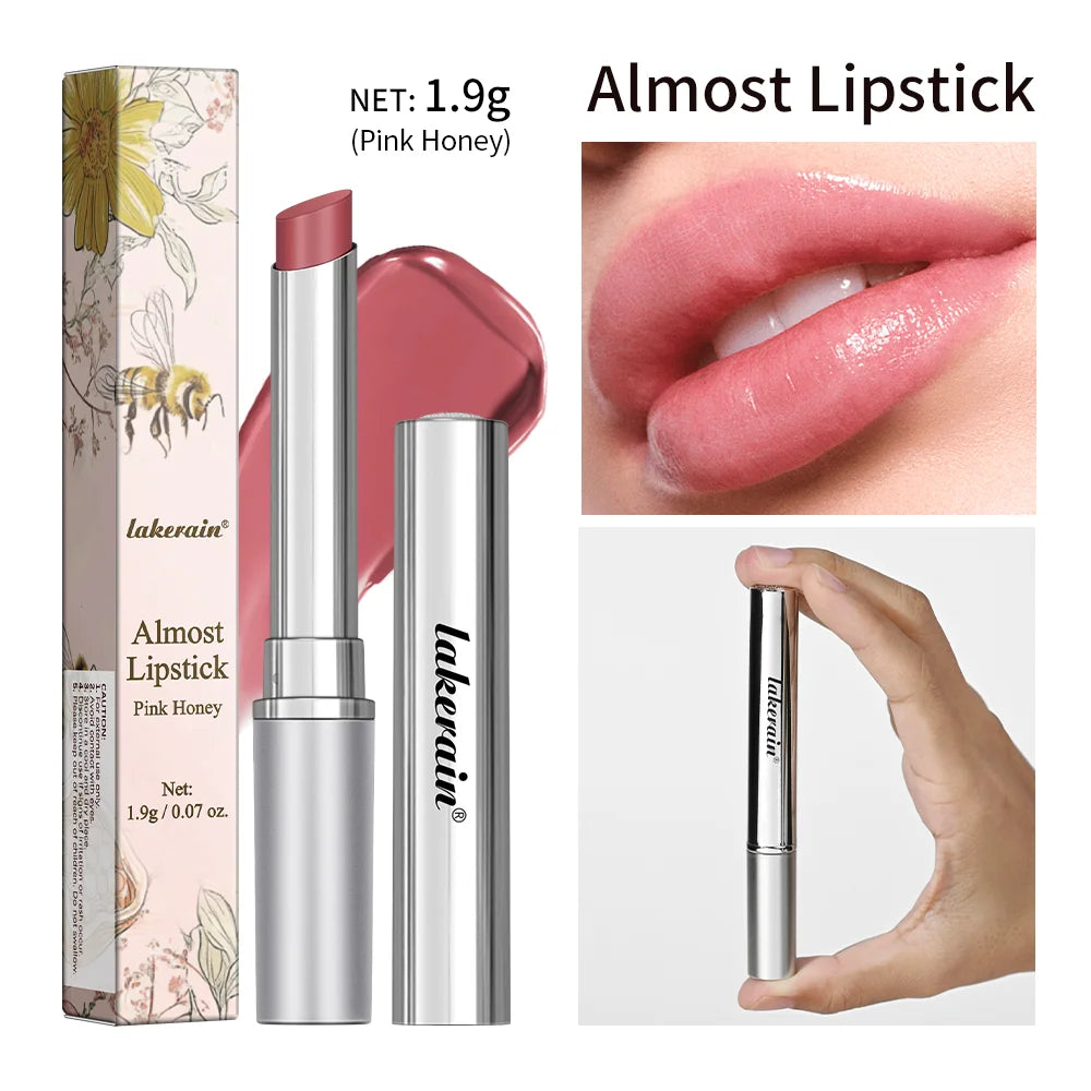 Lakerain Pink Honey tinted lip balm in slim silver tube, showing creamy, moisturizing, glossy pink lipstick on lips.
